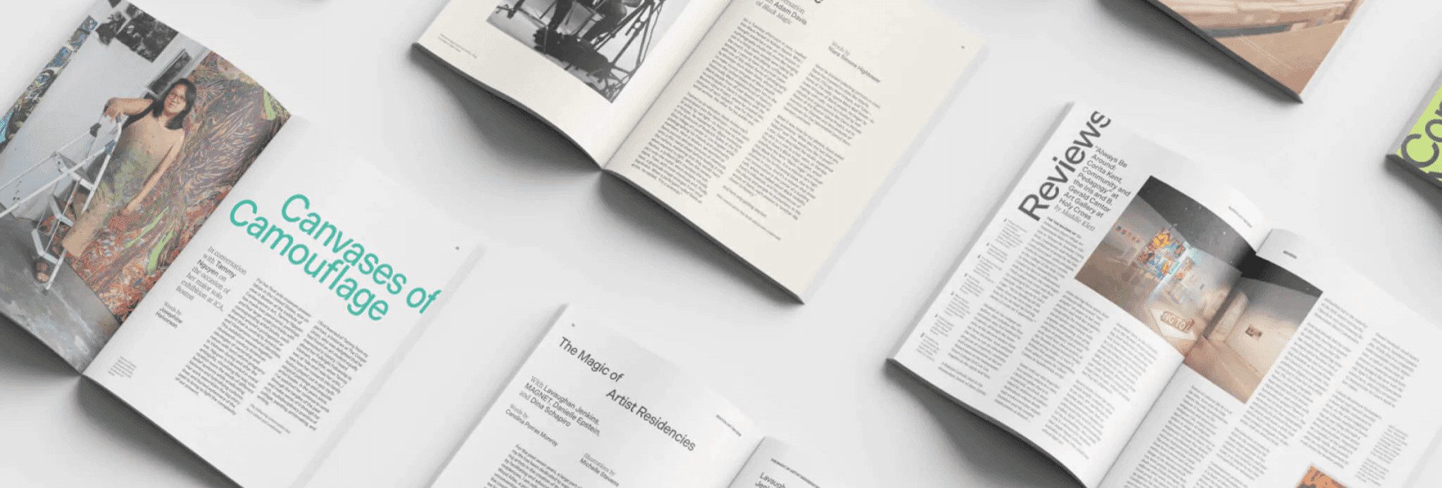 Various spreads from Boston Art Review's Issue 11: Emerge, spread on a grey background